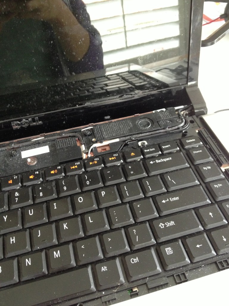 The dusty insides of the front of my laptop